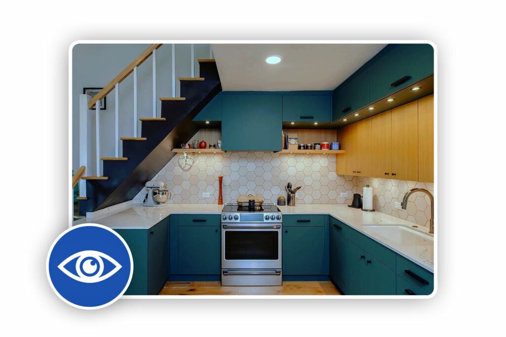 Kitchen remodel featuring modern interior with blue cabinetry and wooden accents.